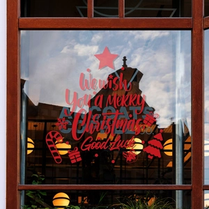 Red Christmas tree window static stickers with Merry Christmas lettering on glass