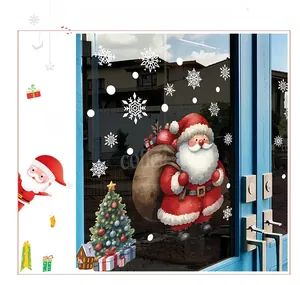 Close-up of static Christmas window clings featuring Santa, trees, and snowflakes on glass