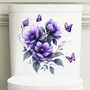 Detail of purple flower and butterfly wall stickers applied on a white surface