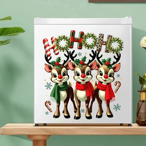 Detailed view of cartoon reindeer Christmas stickers on a white fridge for holiday decor