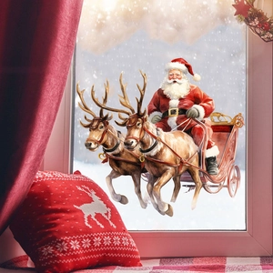Christmas decorative pillow with white reindeer on a festive snowy window backdrop