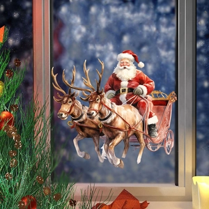 Detail of Santa Claus in a reindeer sleigh window sticker for festive glass decoration