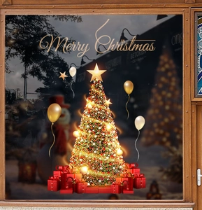 Detail view of gold Christmas tree and red gift box static window clings for shop decoration
