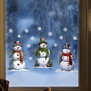 Detail view of festive snowman static window clings with white snowflake decorations