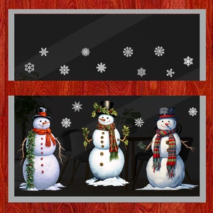 Detail of Christmas snowman window clings set with snowflakes on a glass door