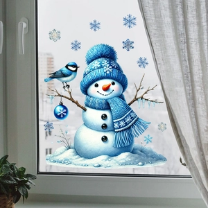 Detail of Christmas window stickers featuring a blue snowman and delicate snowflakes