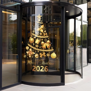 Golden Christmas tree window sticker with Merry Christmas 2026 text on a glass door