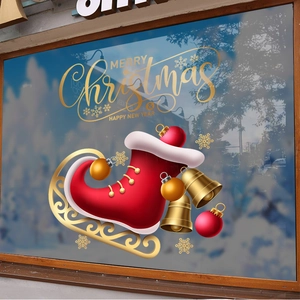 Christmas window sticker featuring festive red stockings, gold bells and holiday greetings