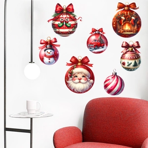 Modern festive scene with Santa Claus and snowman themed wall stickers on a white interior wall