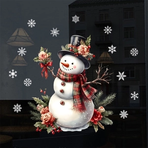 Detailed view of snowman window decal with floral hat and red plaid scarf on glass