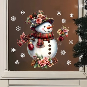 Close-up of a festive snowman window sticker with red plaid hat and white snowflakes
