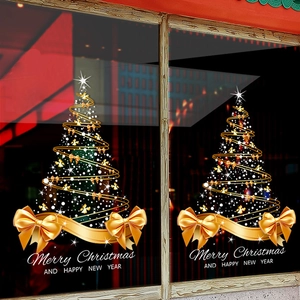 Christmas tree window cling stickers with golden ribbon bows and holiday lettering