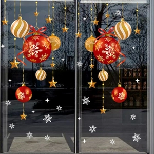 Christmas window decals with red and gold baubles and white snowflakes on glass door
