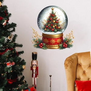 Detail of Christmas tree snow globe wall sticker on white wall with holiday decor