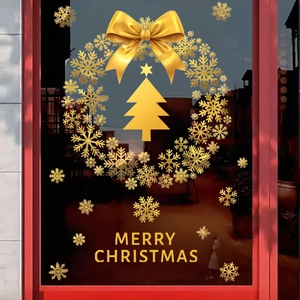 Gold snowflake Christmas tree window cling with wreath and bow for glass decor