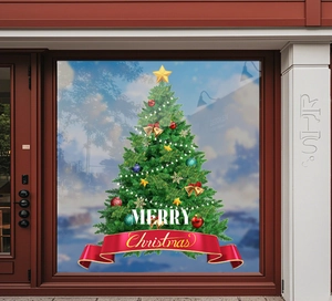 Close-up of a festive Christmas tree window sticker with golden bells and Merry Christmas text