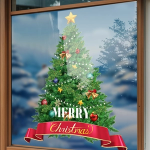 Merry Christmas static window sticker featuring a decorated tree and festive red ribbon banner