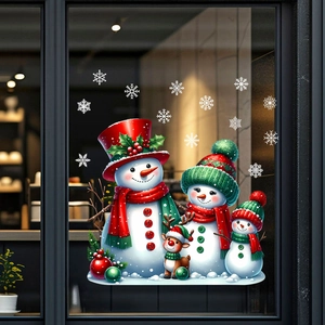 Detail of Christmas window clings featuring snowman family, reindeer and white snowflakes