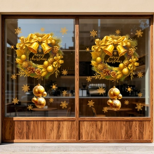 Golden Christmas wreath window stickers with merry christmas text and gold snowflakes