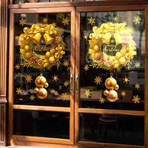Golden Christmas wreath window stickers with merry christmas text and snowflakes