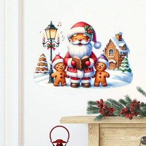 Detailed view of Christmas wall stickers featuring Santa and gingerbread house on a wall