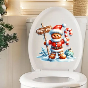 Detail of Christmas gingerbread man and North Pole sign sticker on a white toilet lid