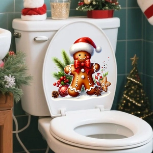 Detailed close-up of a gingerbread man Christmas sticker on a white toilet lid