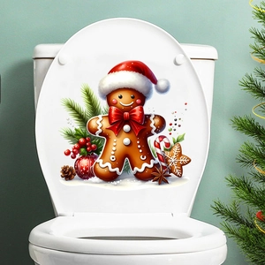 Detailed view of gingerbread man Christmas sticker on a white toilet lid cover