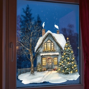 Detail of Christmas electrostatic window stickers with snowy house and glowing tree