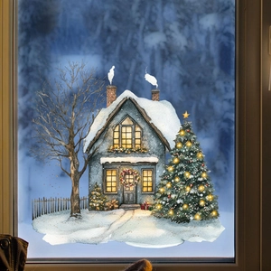 Detail of Christmas window sticker featuring a snowy cottage and glowing tree