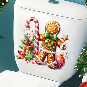 Detail of Christmas gingerbread and candy cane decals applied on a white surface