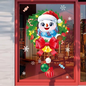 Sticker de fenêtre de Noël avec un bonhomme de neige mignon et un nœud rouge festif