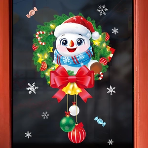 Détail d'autocollant de fenêtre bonhomme de neige avec couronne et cloches de Noël