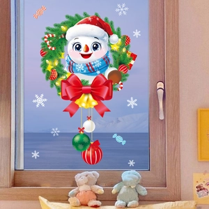 Détail de l'autocollant statique bonhomme de neige avec couronne de Noël et nœud rouge