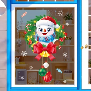 Détail de stickers de Noël avec bonhomme de neige, couronne étoilée et nœud rouge