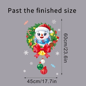 Détail montrant les dimensions 60x45cm du sticker bonhomme de neige et le motif festif