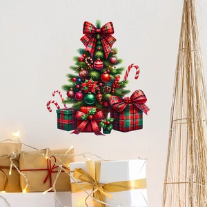 Detail of Christmas tree wall sticker with gift boxes and candy canes on white wall