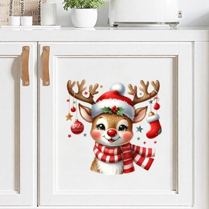 Christmas reindeer wall decal with festive hat and scarf on white cabinet door