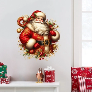 Detail of Santa Claus wall decal with gold-trimmed robes and red berries on a white wall