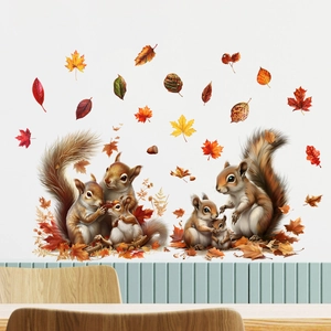Detailed view of squirrel and maple leaf wall decals on a clean white surface