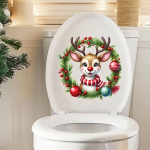 Close-up of Christmas reindeer wreath sticker applied on a white toilet lid cover
