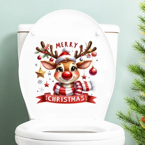 Close-up of Christmas reindeer decal with Merry Christmas text on a white toilet lid