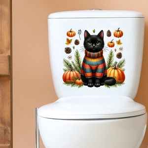 Waterproof self-adhesive toilet sticker featuring a cute black cat in sweater with pumpkins