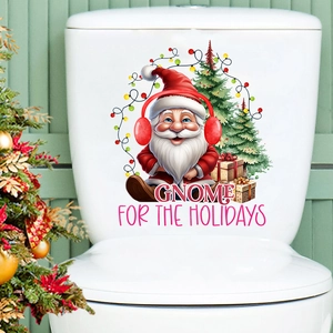 Detail of Christmas gnome decal and holiday trees applied to a white ceramic toilet tank