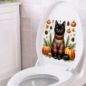 Detail of waterproof toilet sticker featuring a cat in a sweater with autumn pumpkins