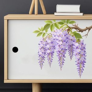 Detail of realistic purple wisteria flower wall stickers on a modern white cabinet door