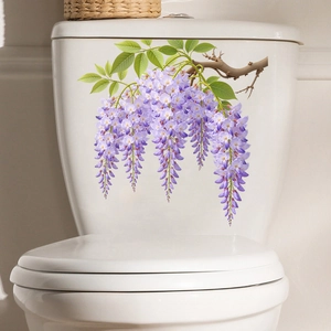 Close-up of purple wisteria flower stickers applied on a white bathroom toilet tank