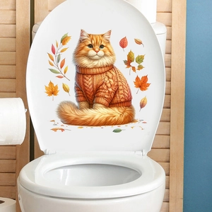 Orange longhair cat wearing orange sweater toilet lid sticker shown in bathroom setting