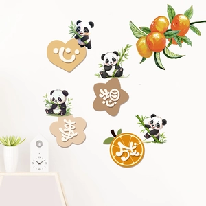 Close-up of decorative panda and bamboo wall stickers with lucky orange elements