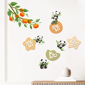 Detailed view of panda wall stickers with bamboo and persimmons on a white wall